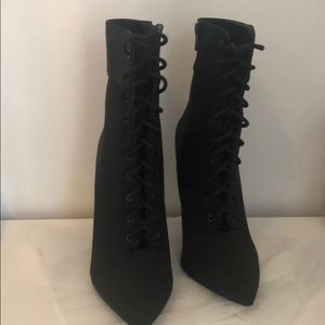 Heeled lace up booties